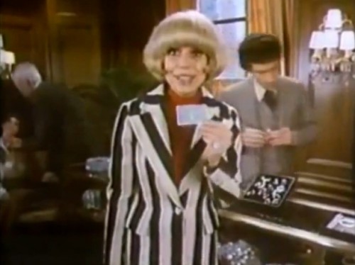 Carol Channing whips out her Amex to purchase some diamonds, 1977