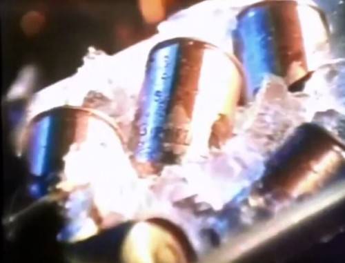 Have an icy, steel can of Michelob (1974)