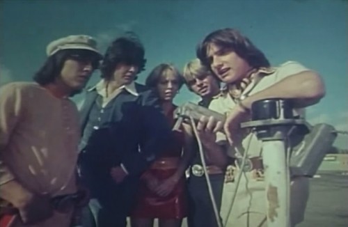 'The Kids from: C.A.P.E.R.' and female friend, 1976