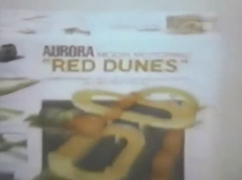 These Sand Vans are so fast even the power supply has a racing stripe! (Aurora 'Red Dunes' model race cars set, 1972)