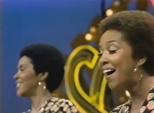 'Reach out and touch a hand, make a friend if you can...' (The Staple Singers, 1974)