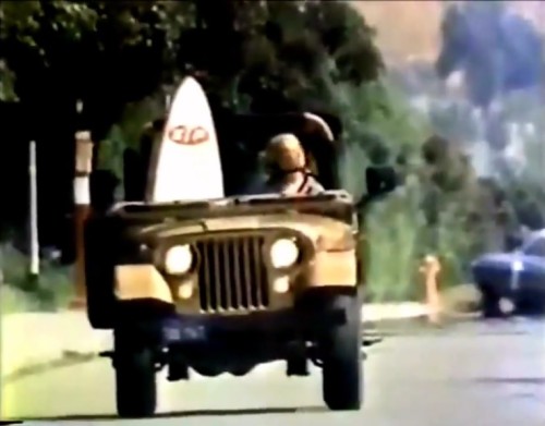 STP surfboard and a California jeep. Must be 1975.
