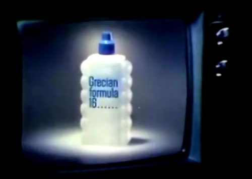 A bottle on the box. (Grecian Formula 16 commercial, 1975)